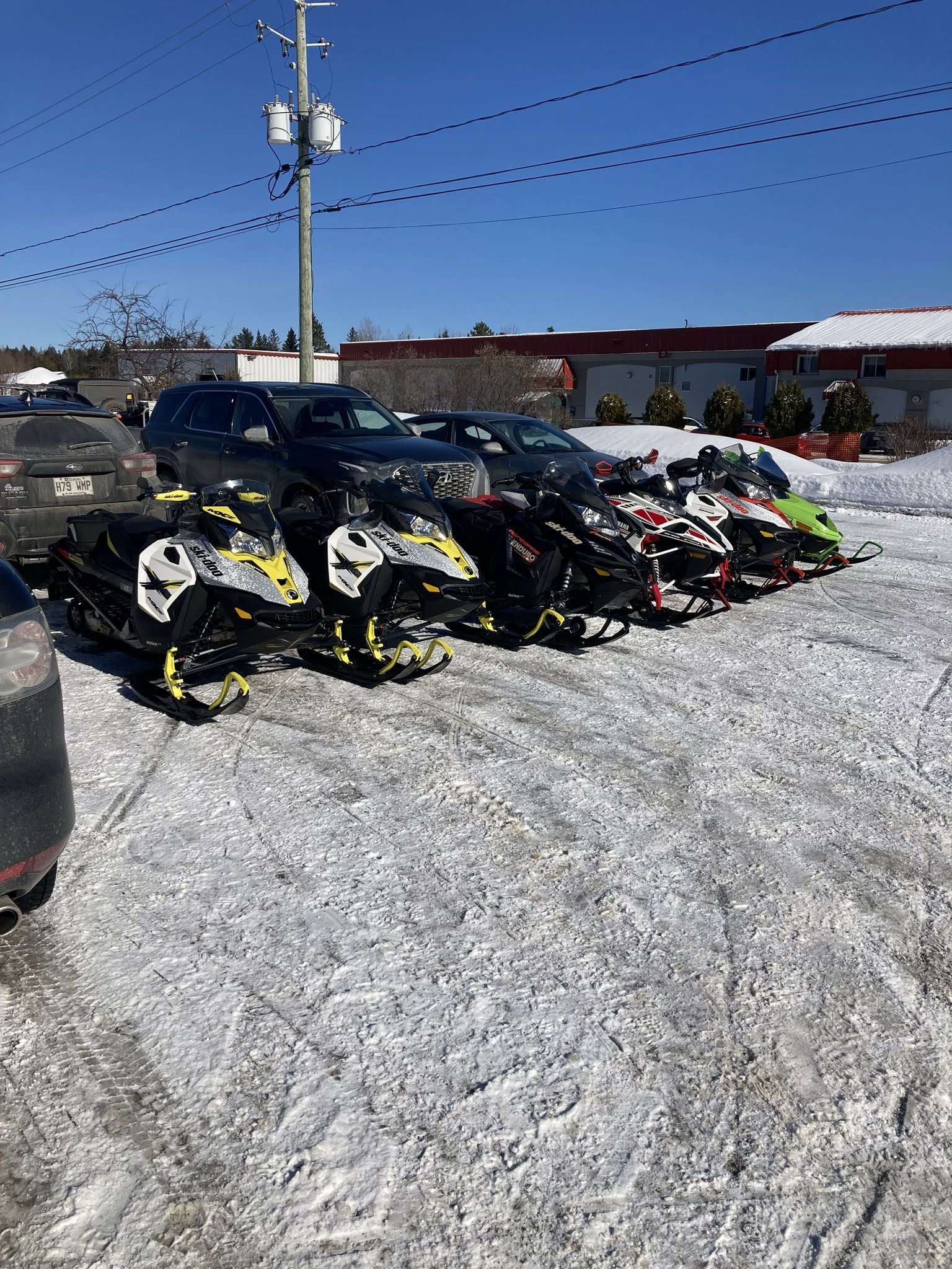 Group of snowmobilers ready for a winter ride