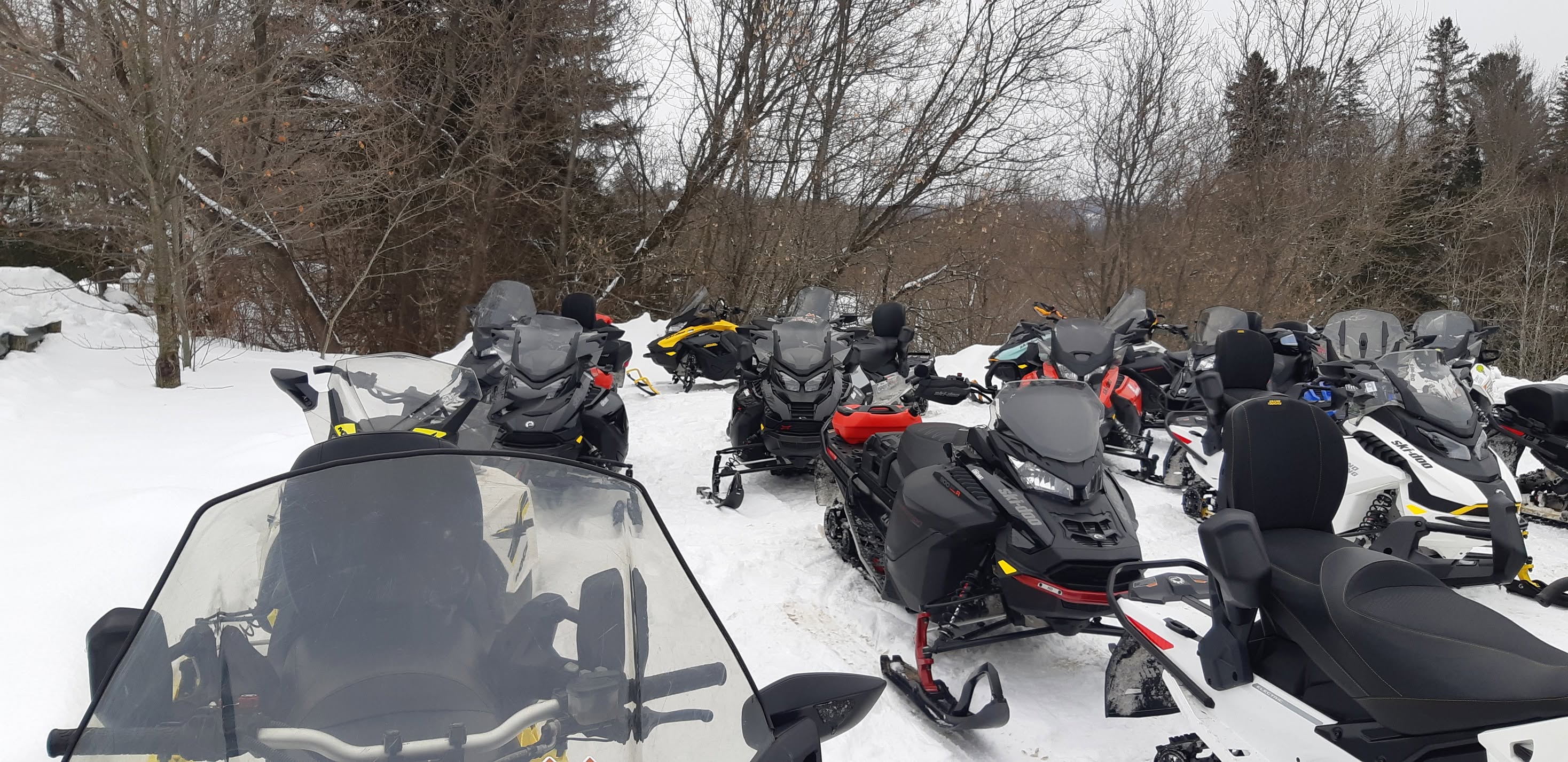 Club Diable et Rouge snowmobile gathering in winter